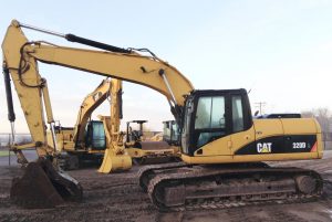Photo of a Caterpillar 320DL excavator similar to the one recovered.