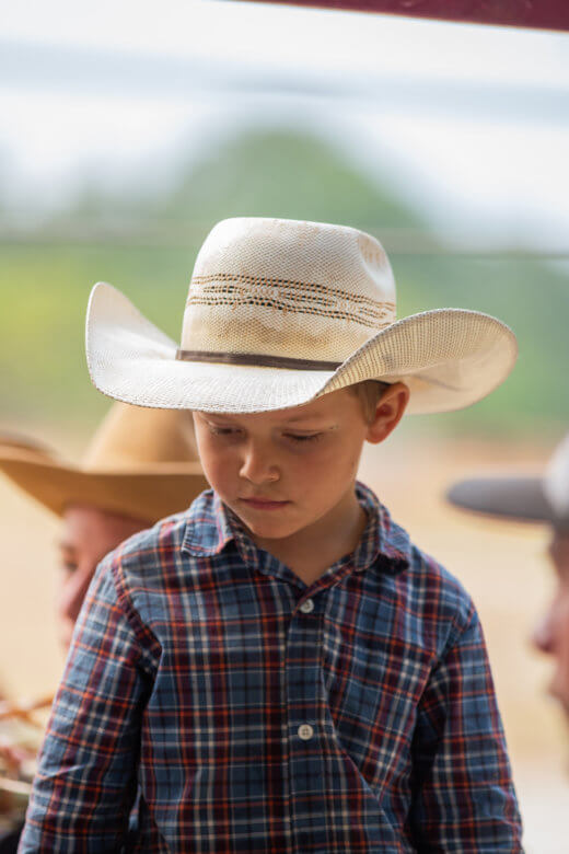 young boy with cowboy hat
